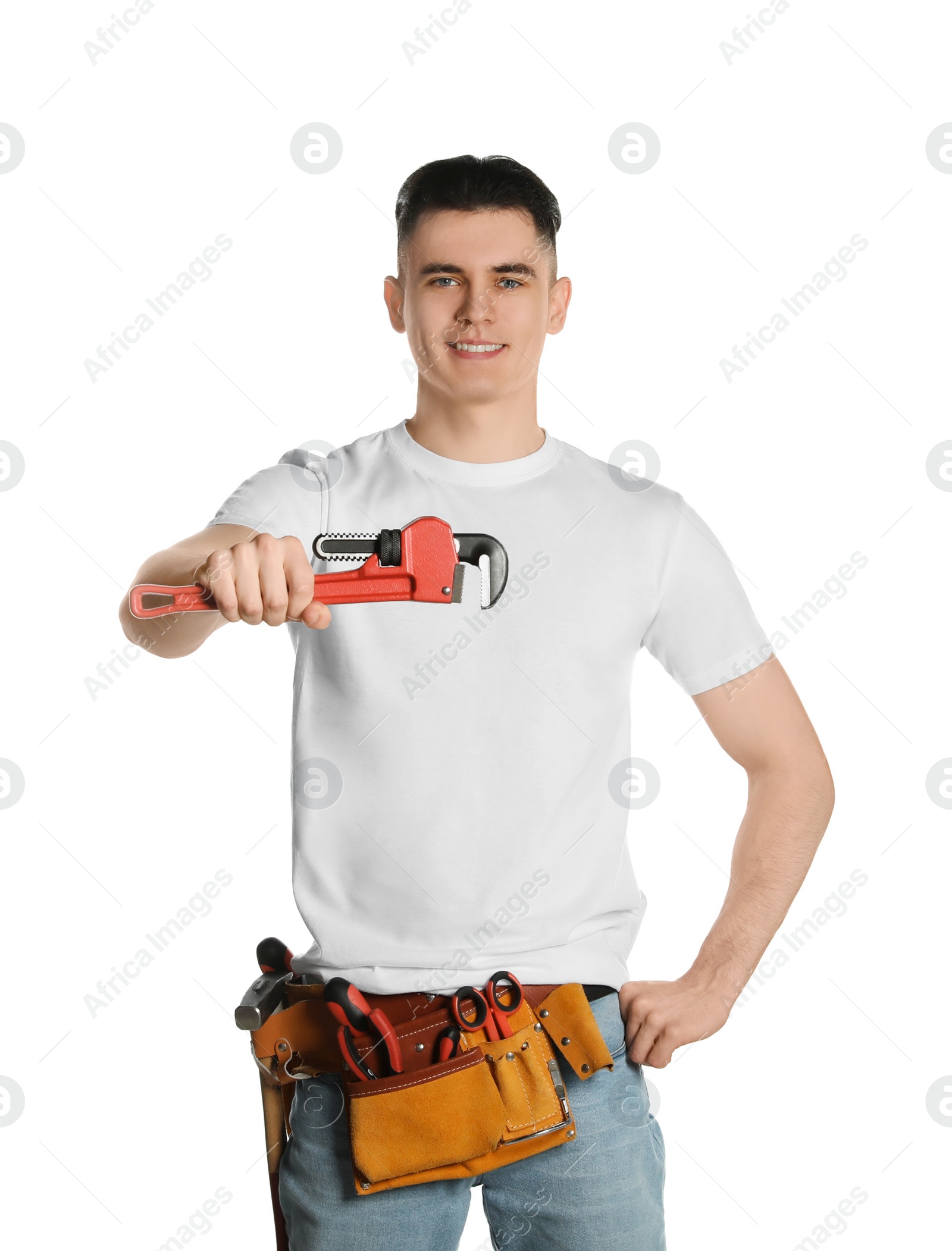Photo of Handyman with tool belt and pipe wrench isolated on white