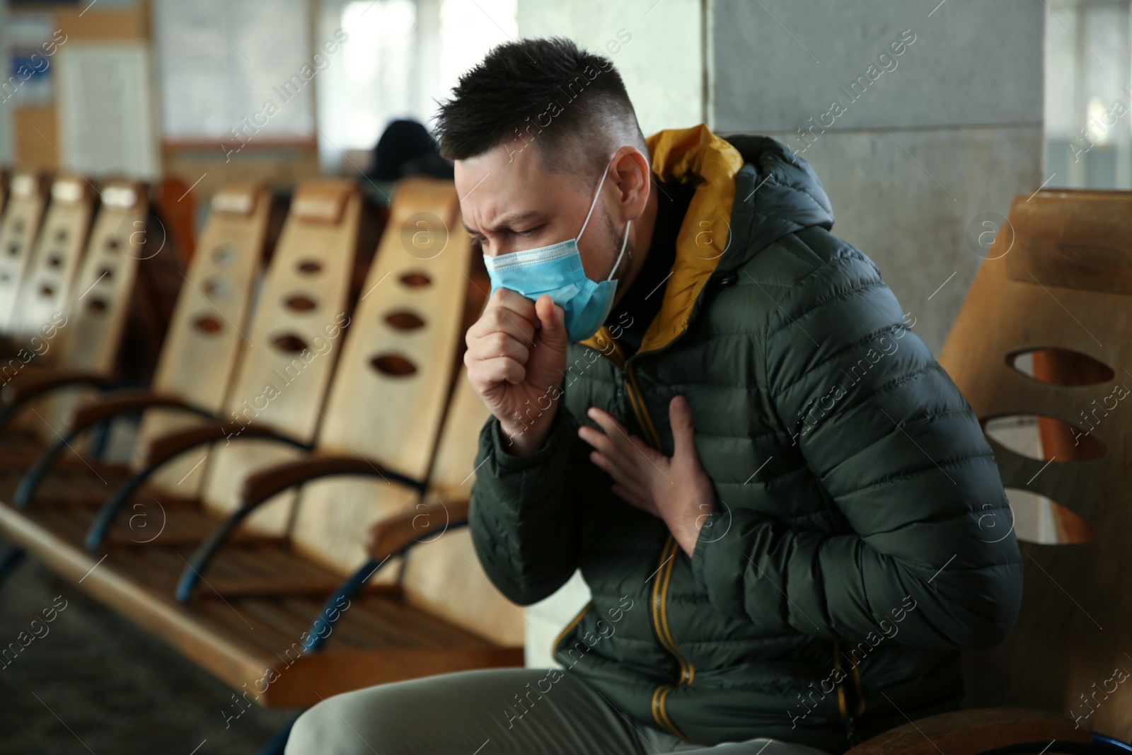 Photo of Man with disposable mask indoors. Virus protection