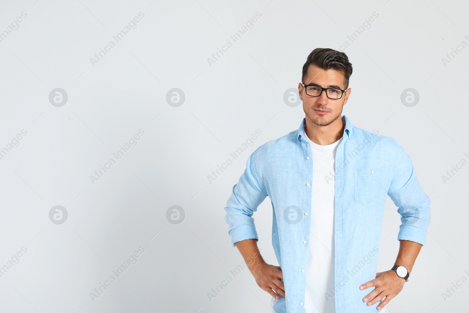 Photo of Portrait of handsome young man and space for text on white background