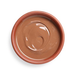 Photo of Melted milk chocolate in bowl isolated on white, top view