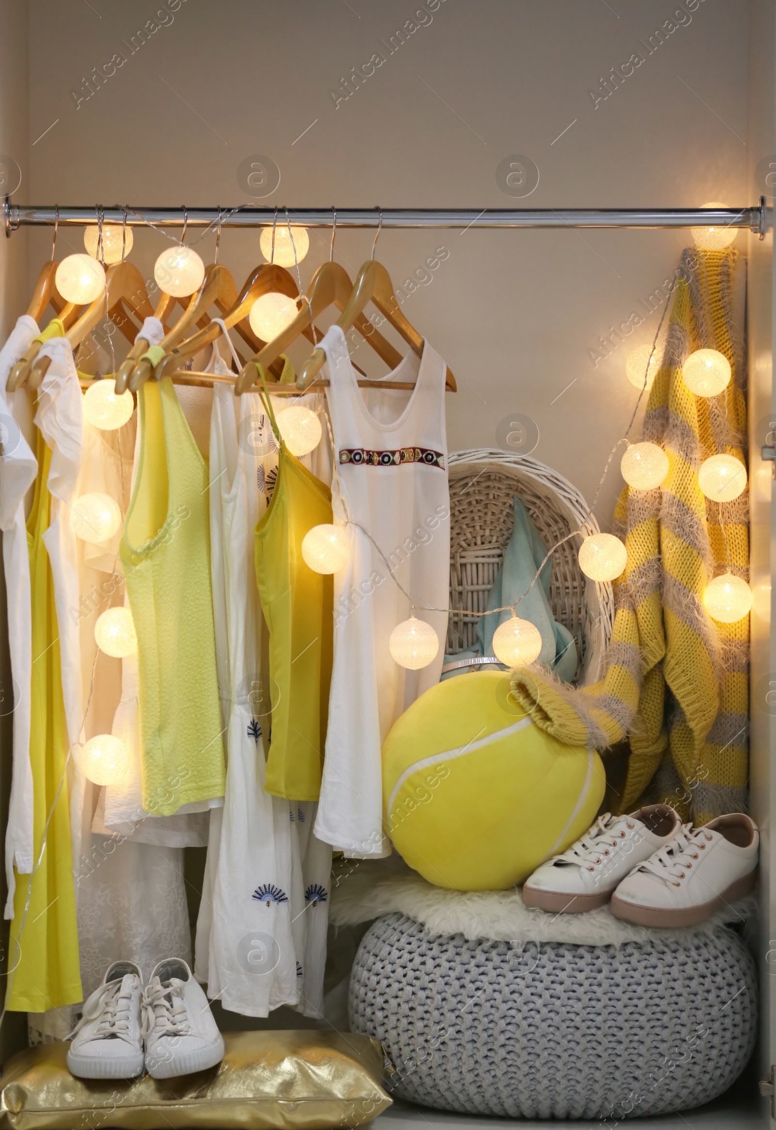 Photo of Women clothing on hangers in wardrobe