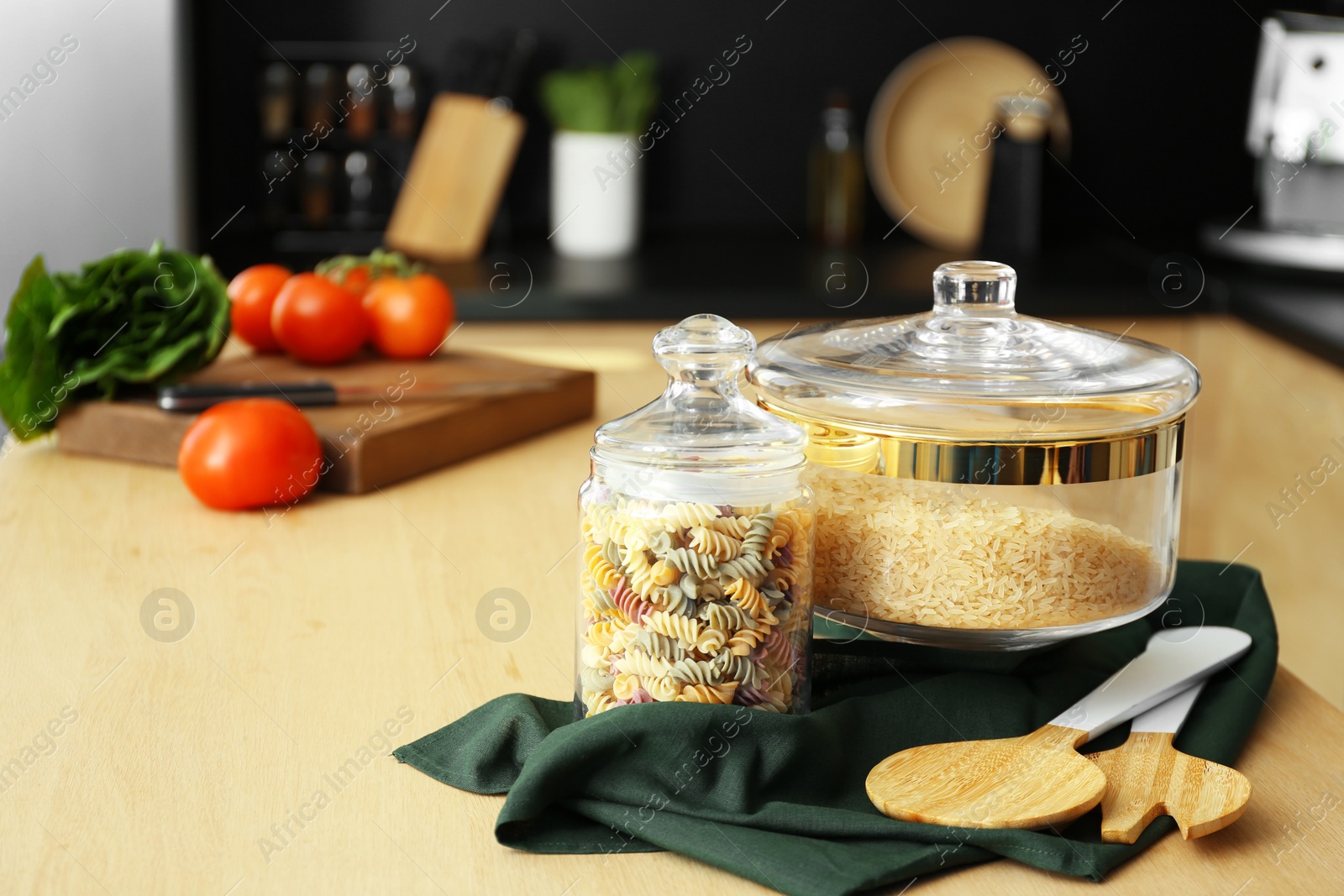 Photo of Products on wooden table in modern kitchen