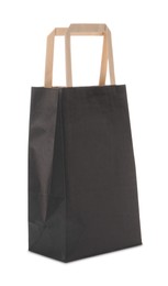 Photo of One black paper bag isolated on white