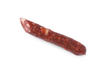 Piece of thin dry smoked sausage isolated on white, top view