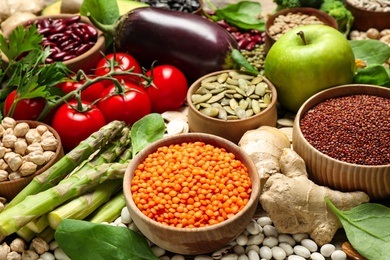 Photo of Different vegetables, seeds and fruits as background, closeup. Healthy diet