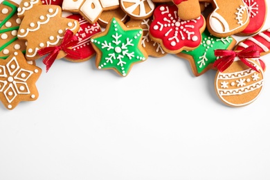 Tasty homemade Christmas cookies on white background, top view