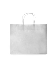 Photo of Mockup of paper shopping bag on white background