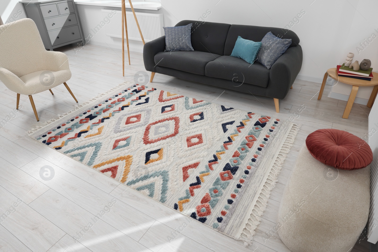 Photo of Living room with beautiful carpet and furniture