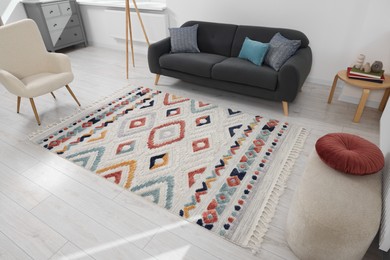 Photo of Living room with beautiful carpet and furniture