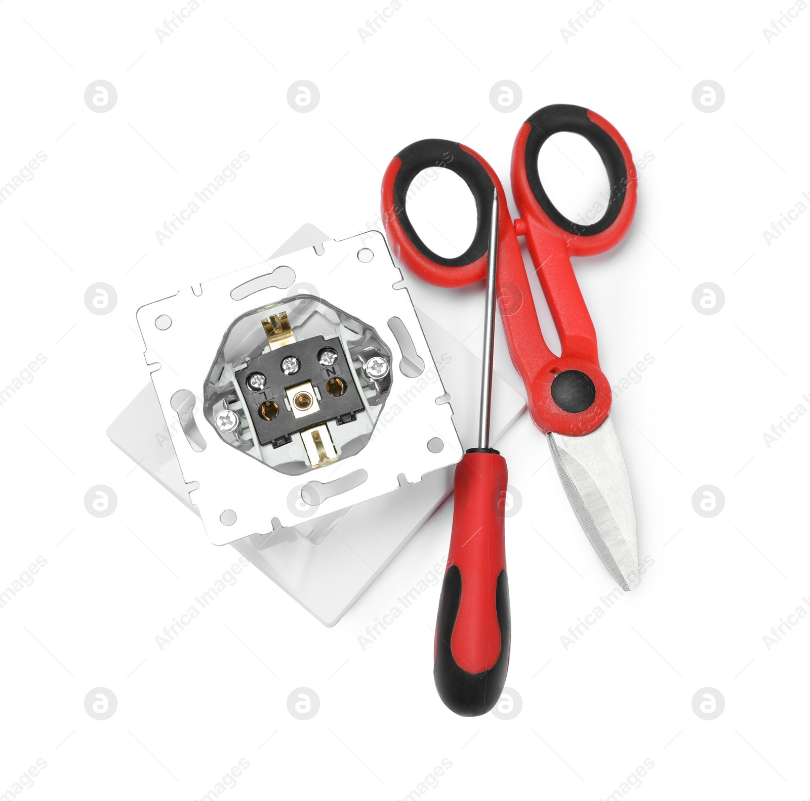 Photo of Socket and electrician's tools isolated on white, top view