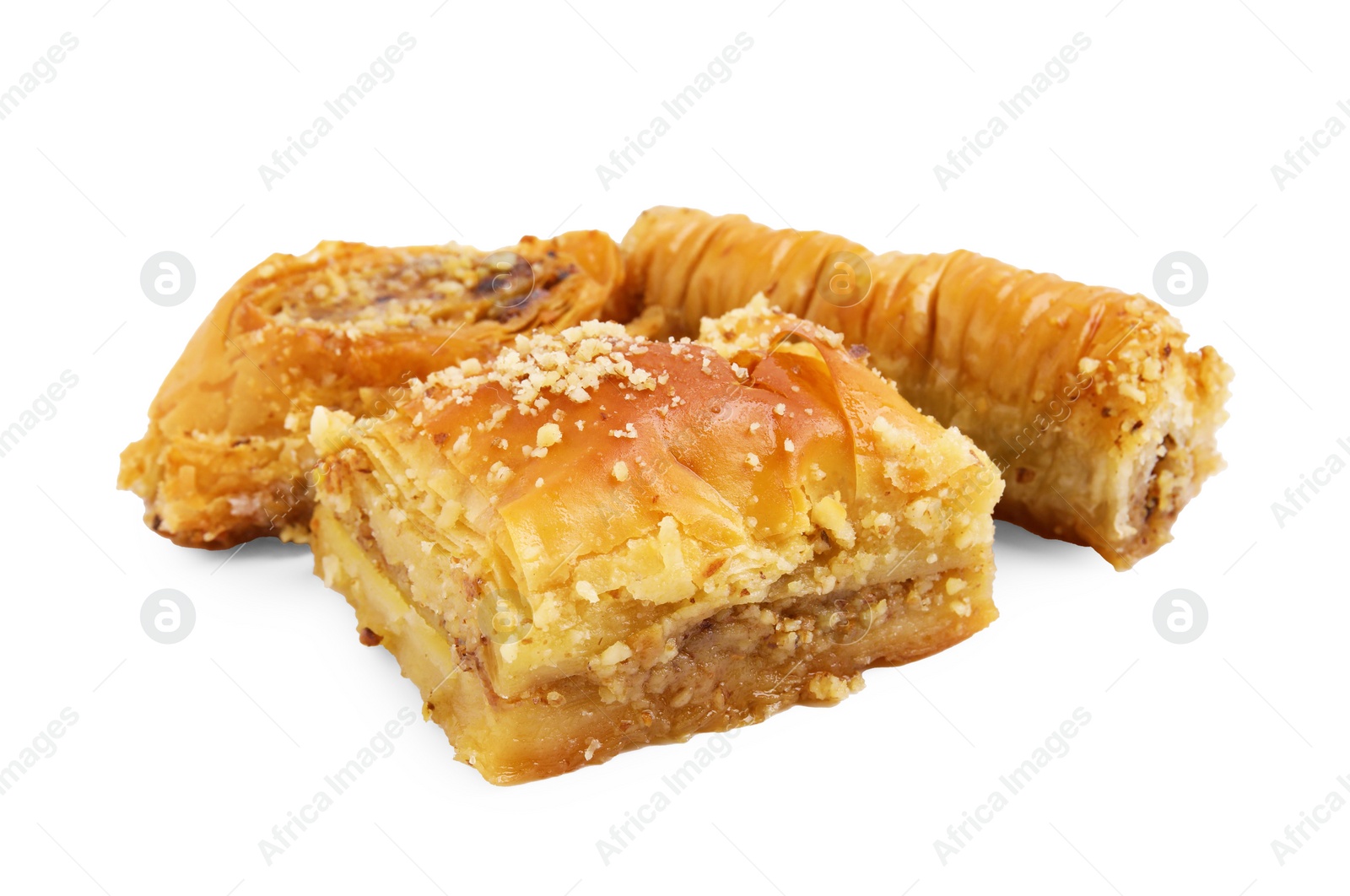 Photo of Eastern sweets. Pieces of tasty baklava isolated on white