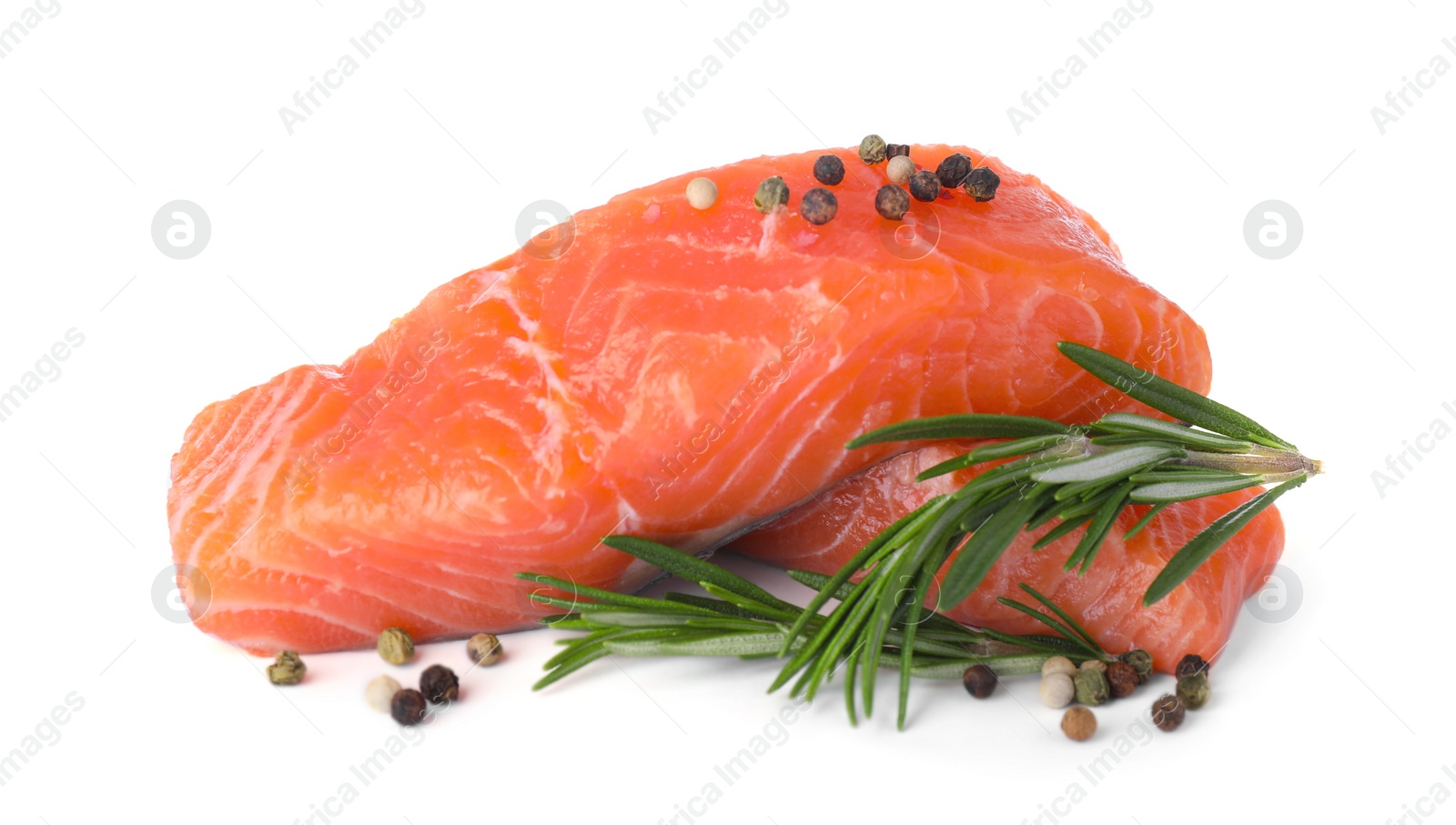 Photo of Pieces of fresh raw salmon and spices on white background