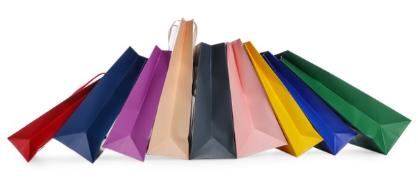 Colorful paper shopping bags isolated on white