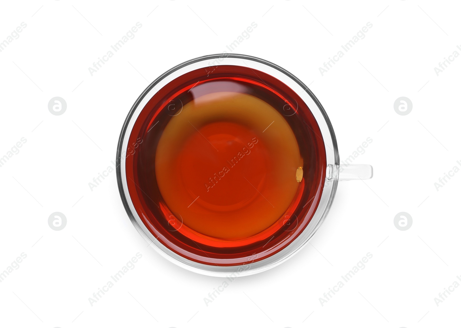 Photo of Glass cup of tea isolated on white, top view