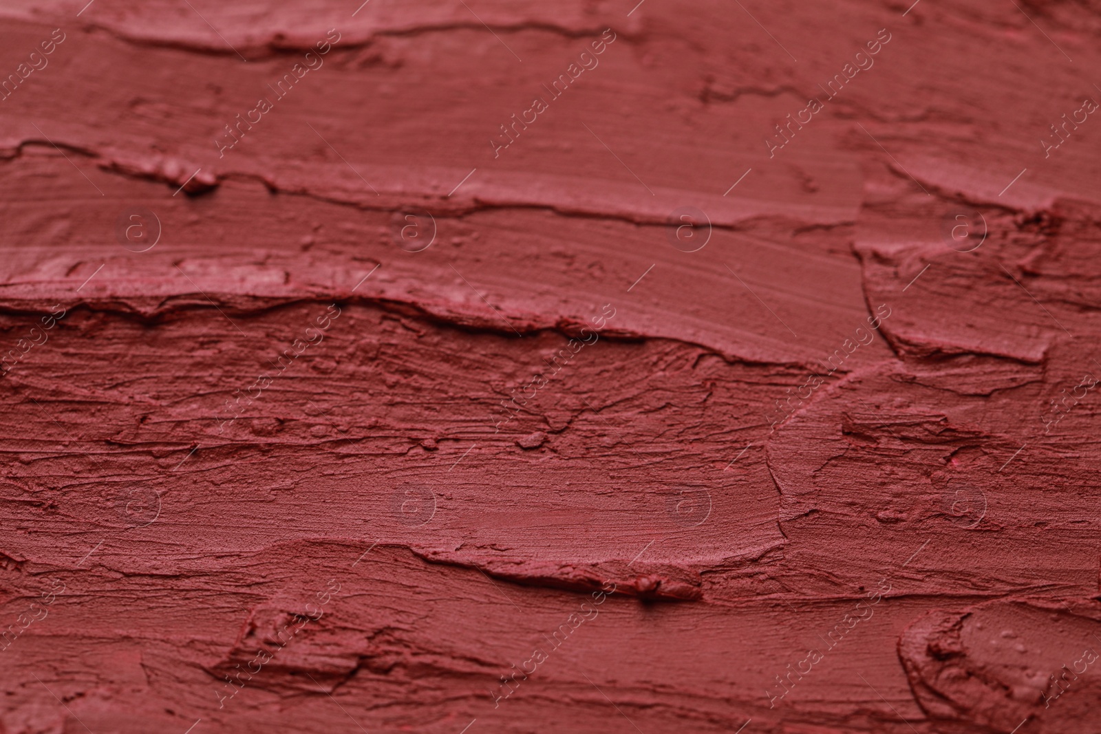 Photo of Texture of bright lipstick as background, closeup