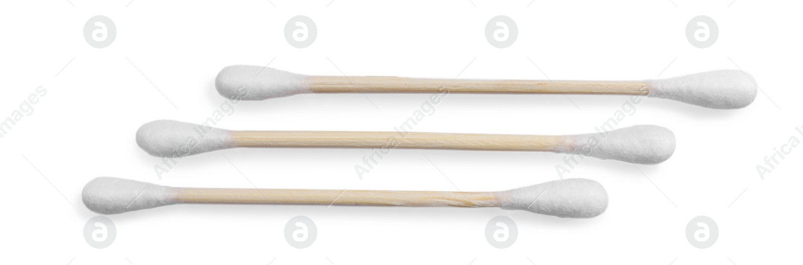 Photo of Wooden cotton buds on white background, top view