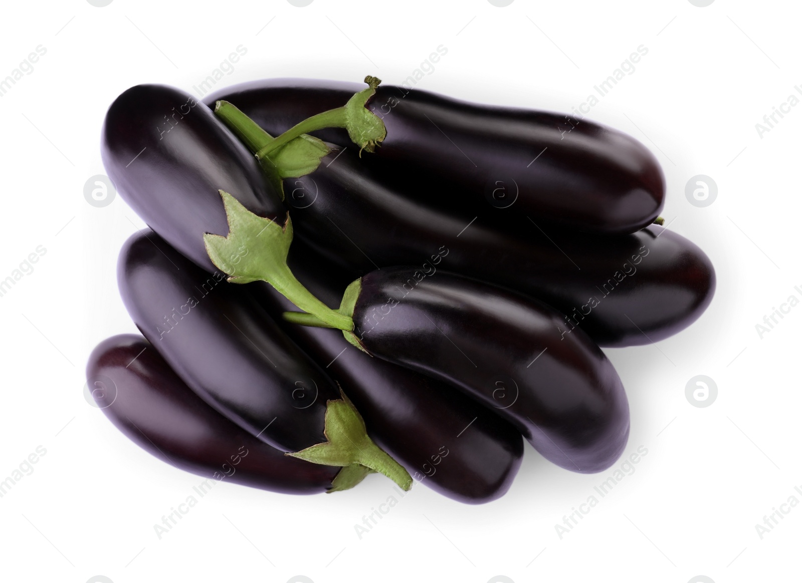 Photo of Pile of raw ripe eggplants isolated on white, top view