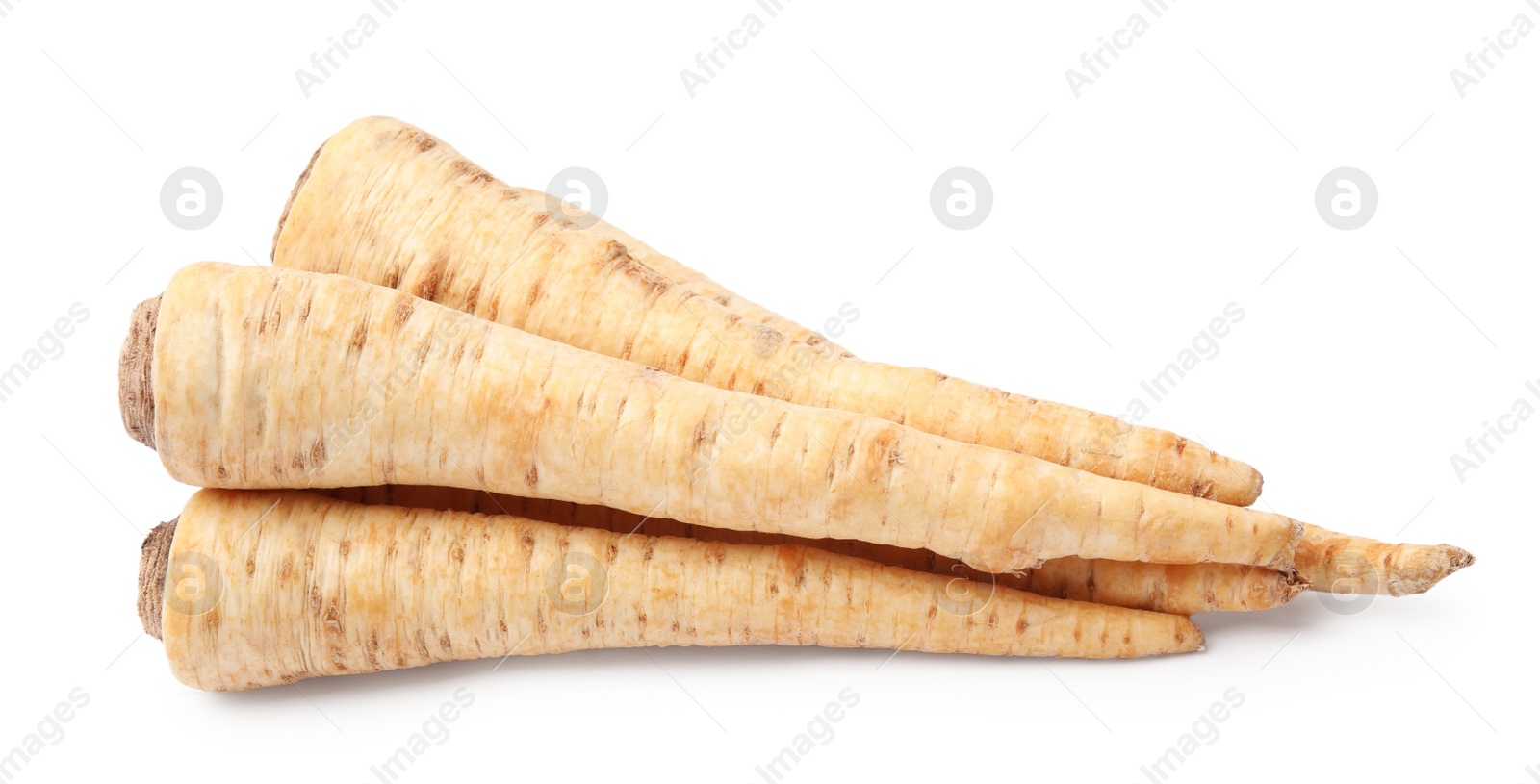 Photo of Raw parsley roots isolated on white. Healthy food