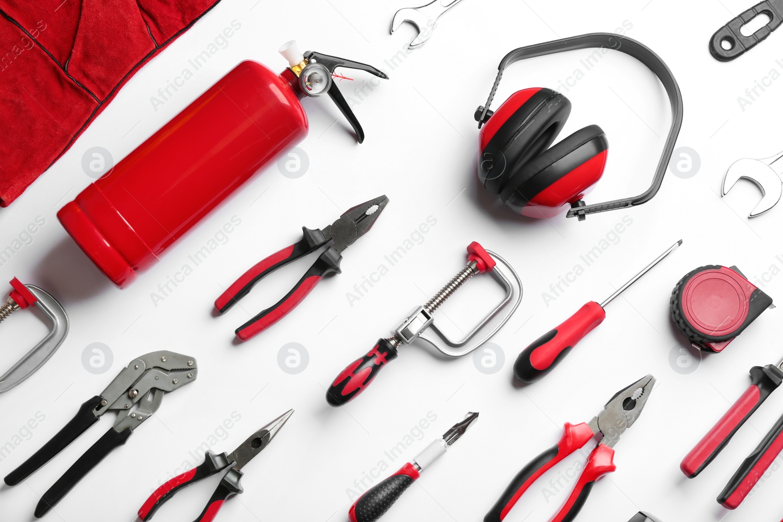 Photo of Set of different construction tools on white background, top view