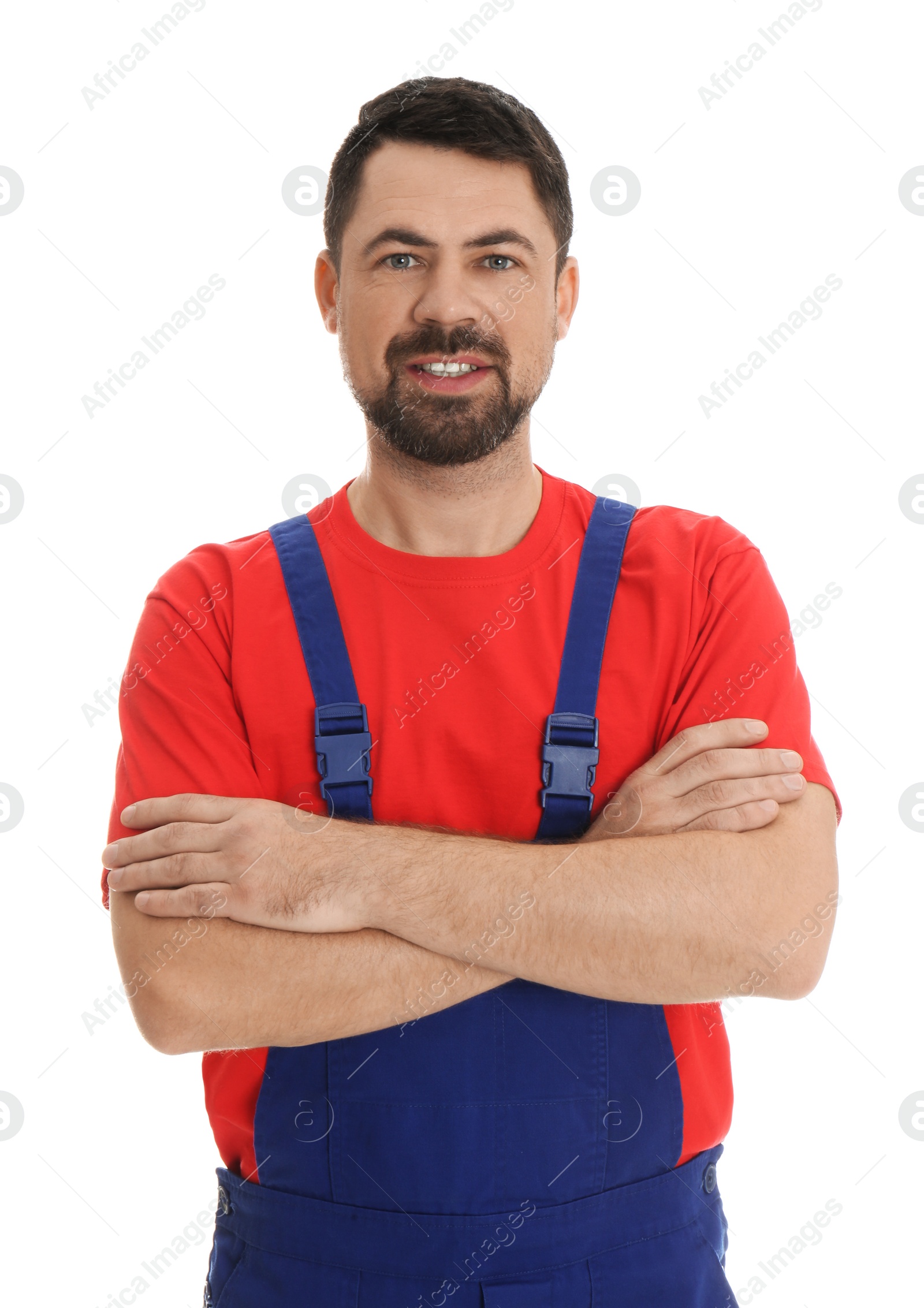 Photo of Portrait of professional auto mechanic on white background