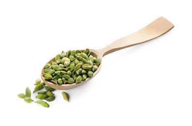 Photo of Wooden spoon with cardamom on white background