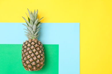 Photo of Fresh pineapple on color background