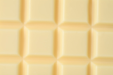 Delicious white chocolate as background, closeup view