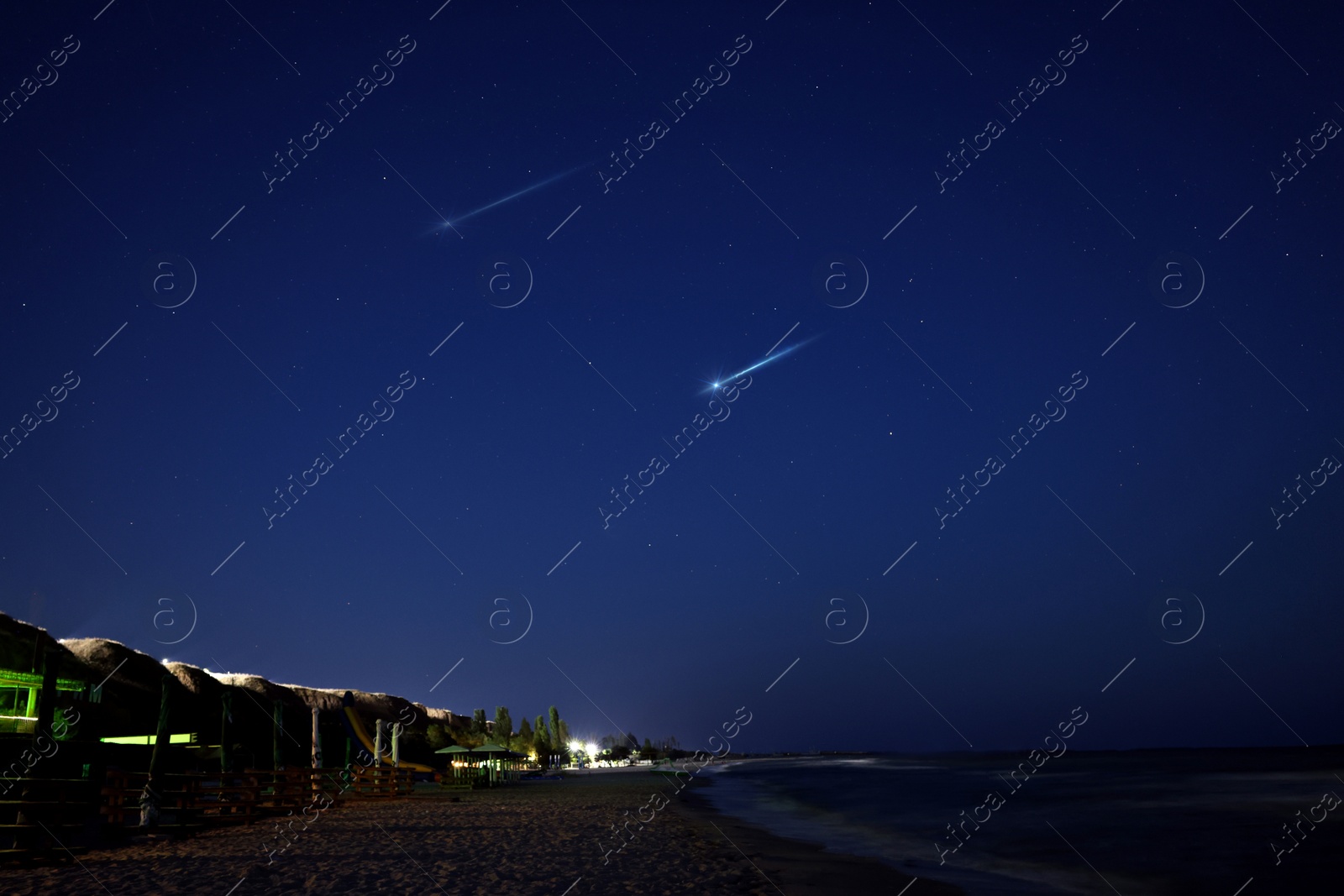 Image of Beautiful view of shooting stars in night sky