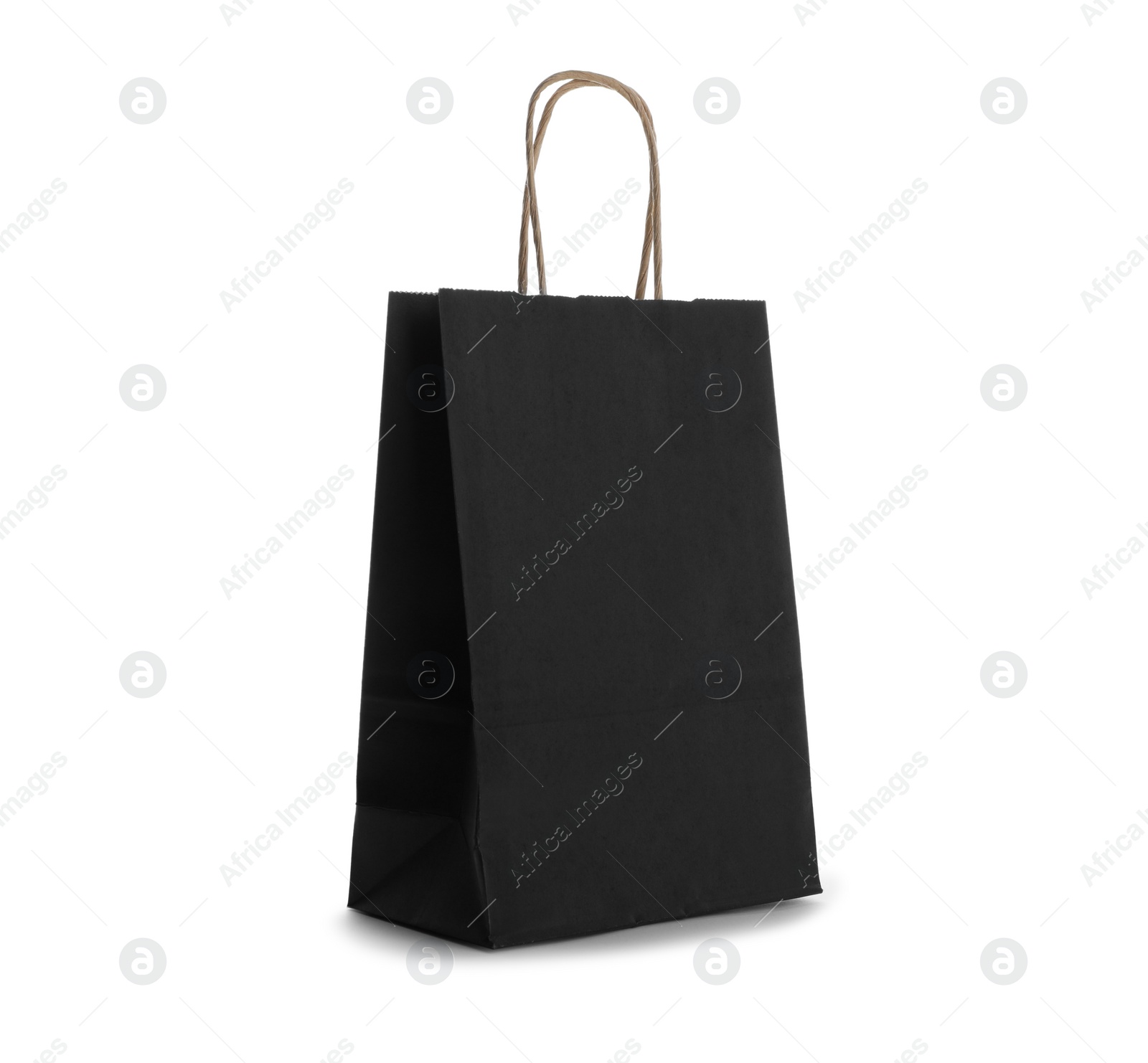 Photo of Blank black paper bag on white background. Space for design