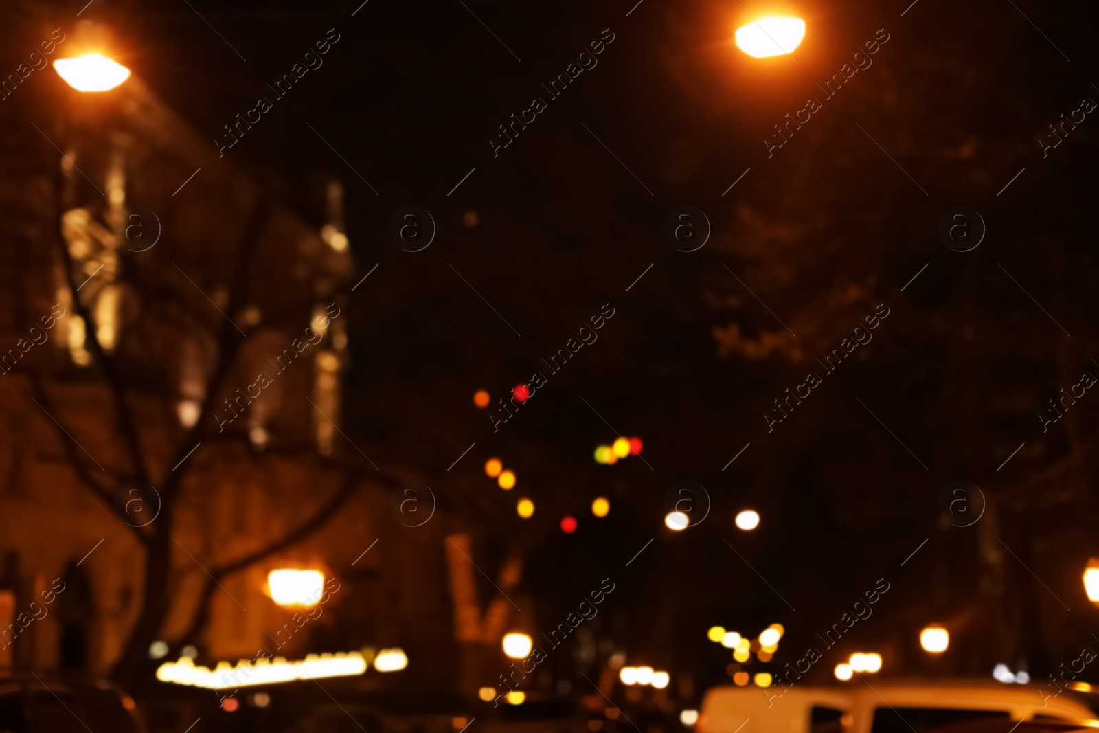 Photo of Beautiful street lights at night. Bokeh effect