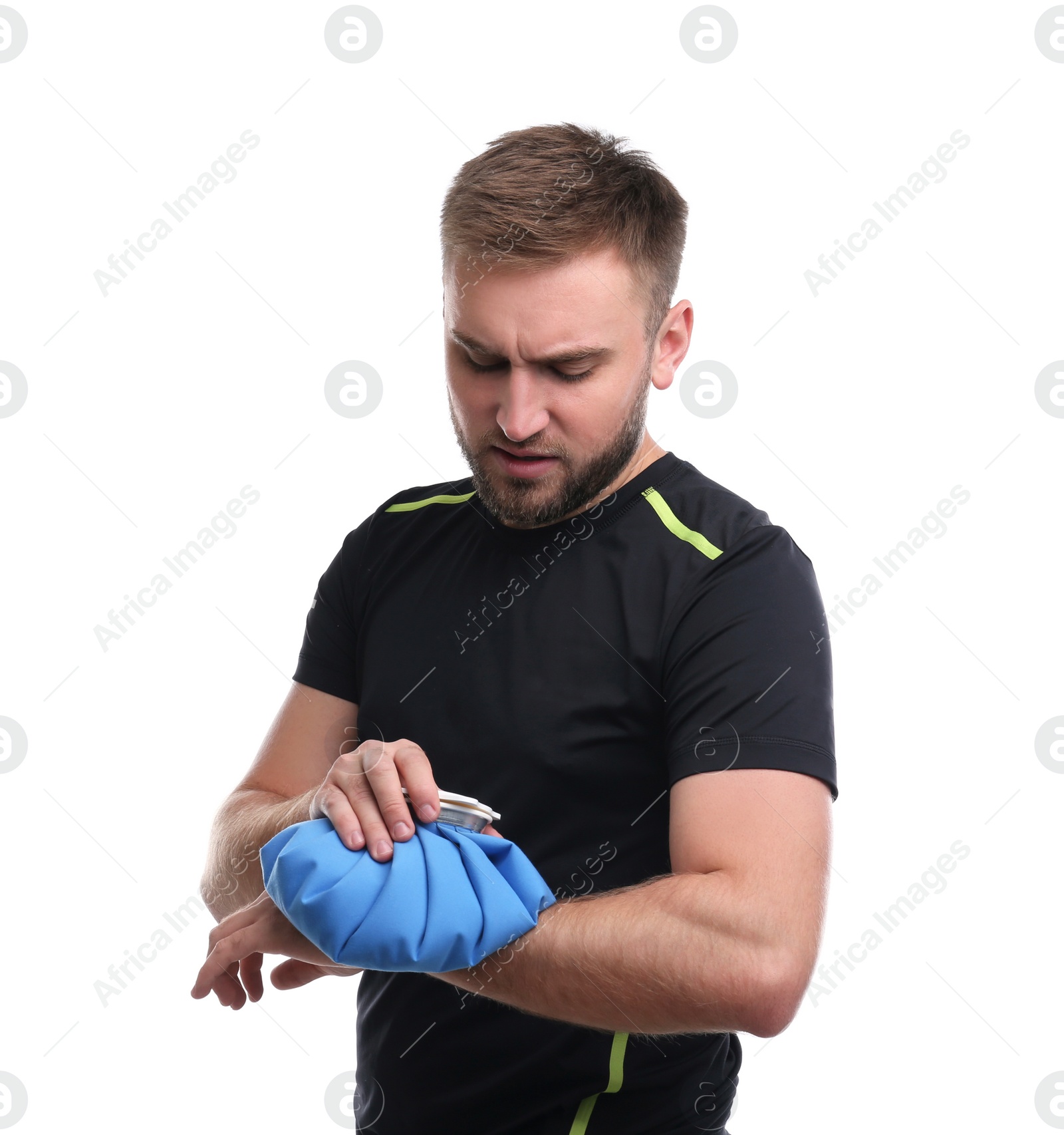 Photo of Young man with cold compress suffering from wrist pain on white background