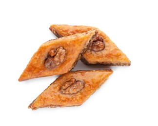 Photo of Delicious turkish baklava on white background, top view. Eastern sweets