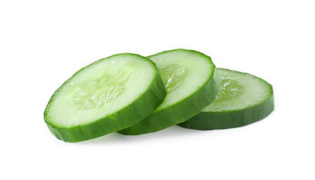 Photo of Slices of fresh green cucumber isolated on white