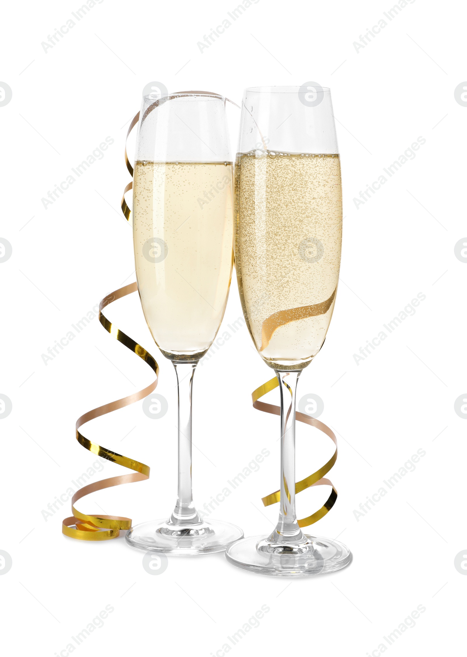 Photo of Glasses of champagne on white background. Festive drink
