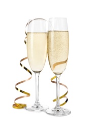 Glasses of champagne on white background. Festive drink