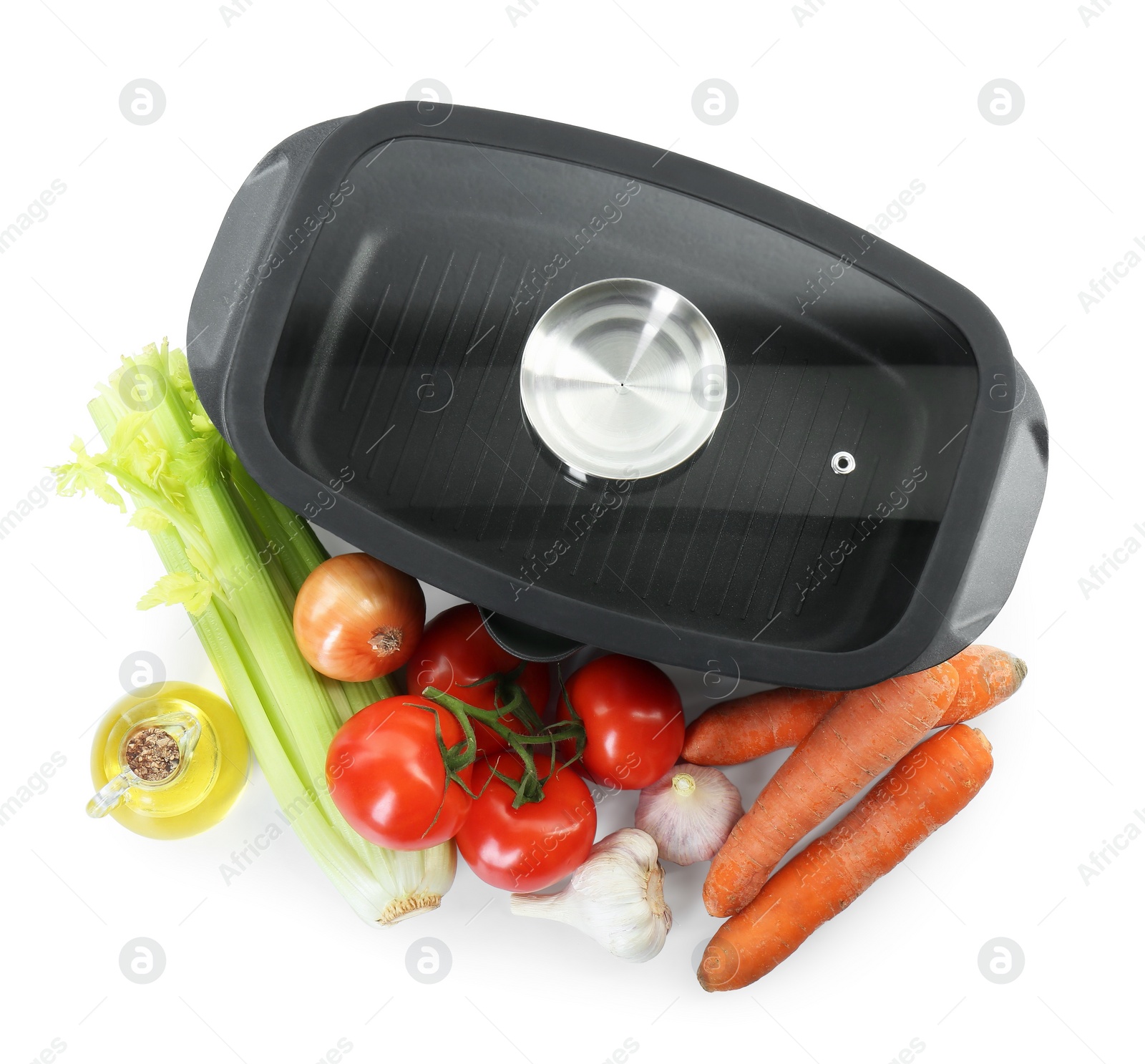 Photo of Black pot, lid and products isolated on white, top view