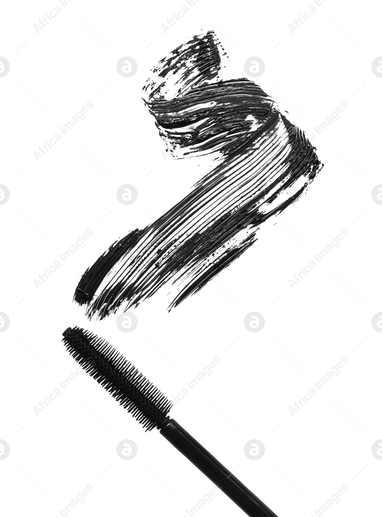 Photo of Smear of mascara and applicator isolated on white, top view