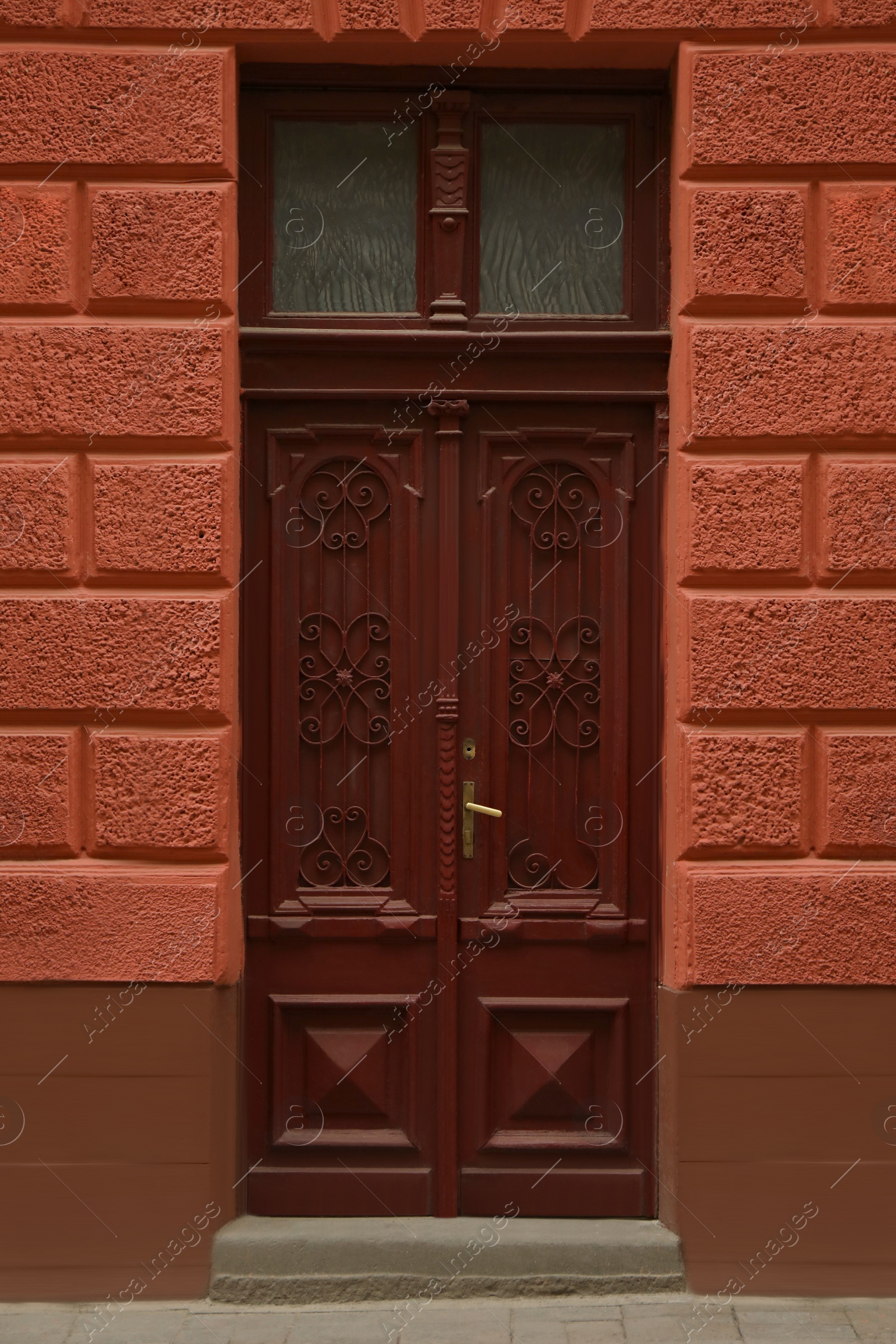 Photo of View of building with wooden door. Exterior design