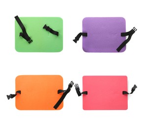 Image of Set with colorful foam tourist seat mats on white background, top view