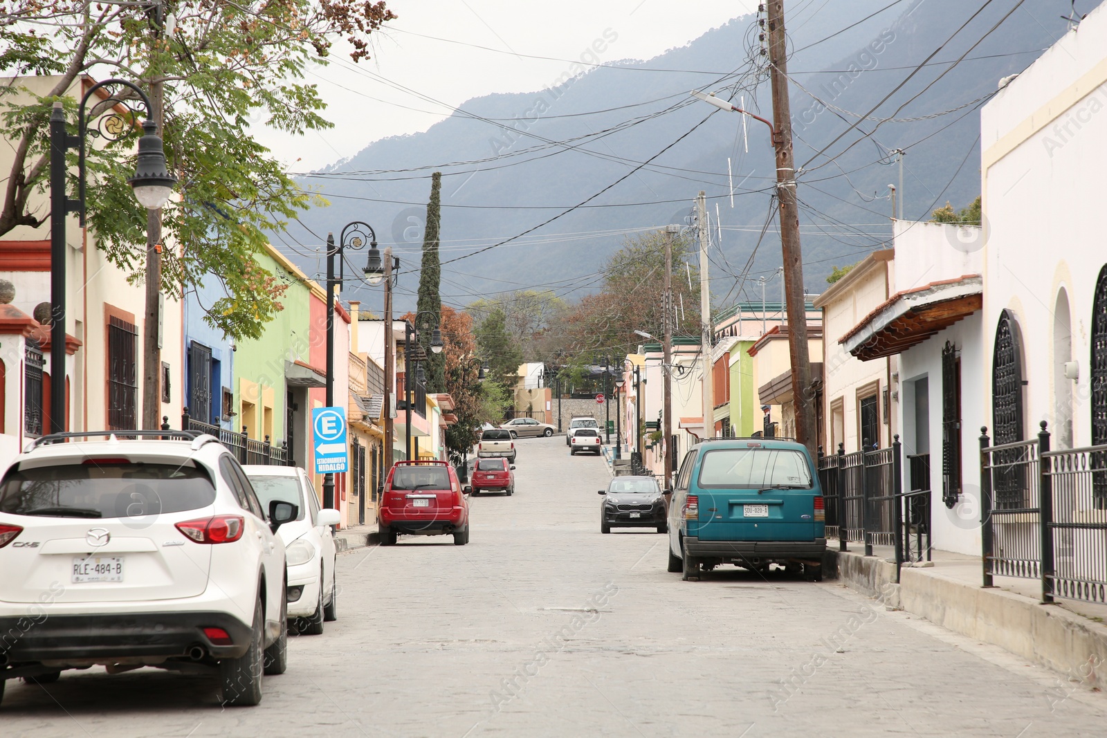 Photo of San Pedro Garza Garcia, Mexico – February 8, 2023: View on street with parked cars and beautiful buildings