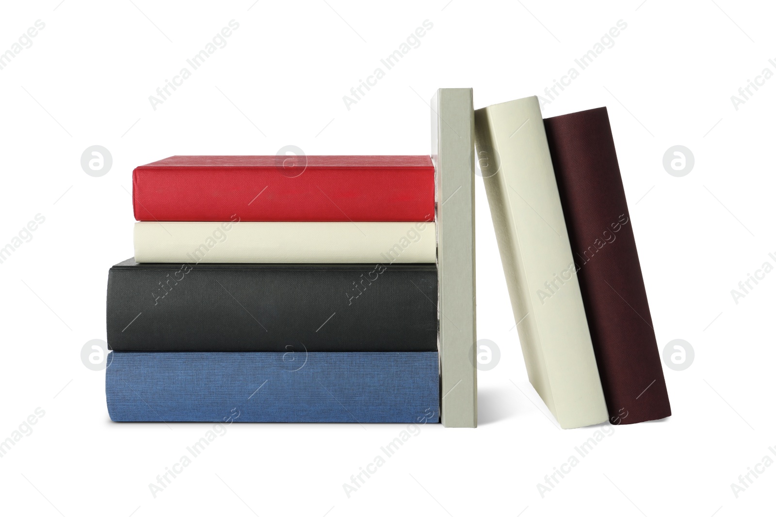 Photo of Many different hardcover books on white background