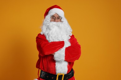 Merry Christmas. Santa Claus on orange background