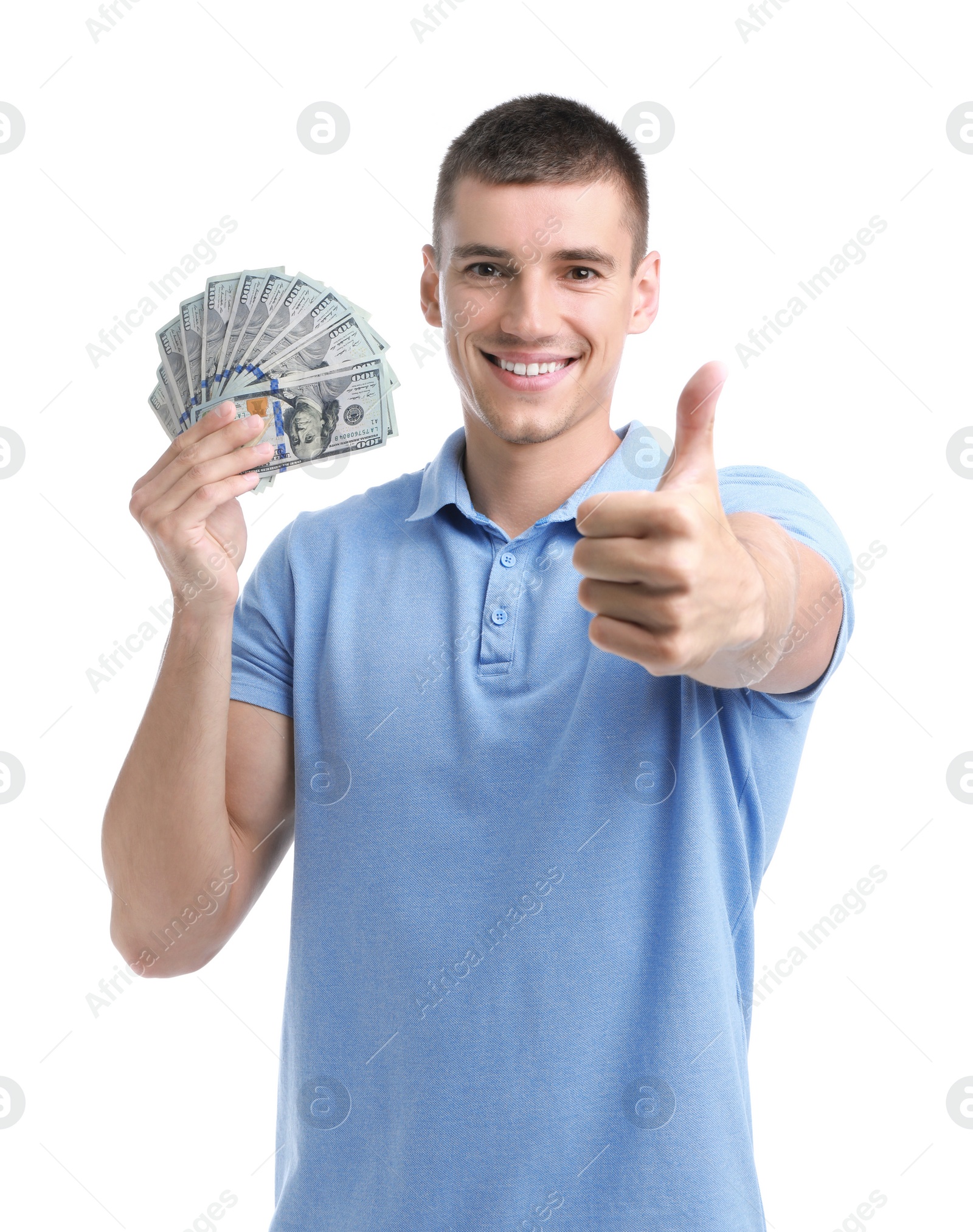 Photo of Handsome young man with dollars on white background