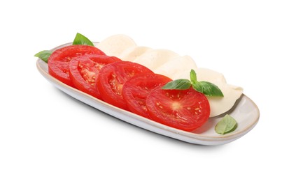 Photo of Plate of delicious Caprese salad with tomatoes, mozzarella and basil isolated on white