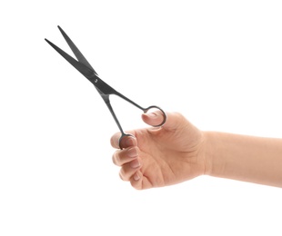 Woman holding hairdresser's scissors on white background, closeup