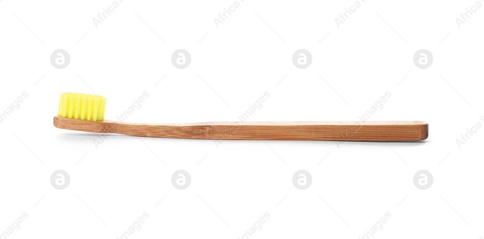 Photo of Toothbrush made of bamboo on white background