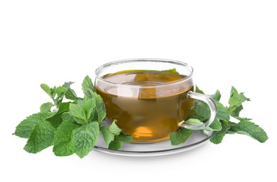 Photo of Cup with hot aromatic mint tea and fresh leaves isolated on white