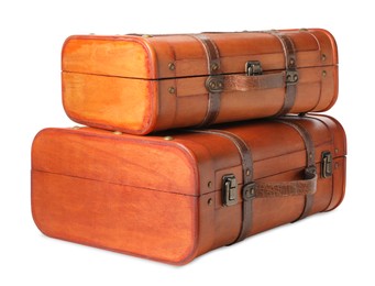 Photo of Beautiful brown vintage suitcases on white background