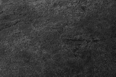 Image of Texture of dark grey stone surface as background, closeup