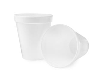 Photo of Two clean styrofoam cups on white background